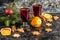 Christmas mulled wine with ginger biscuits orange cinnamon clove anise and fir tree on the dark table