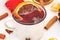 Christmas mulled wine. Merry Christmas. a cup mulled wine with cinnamon and anise, top view. Selective focus