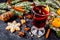 Christmas mulled wine with spices in cup on dark background