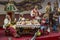 Christmas nativity scene, detail of a Neapolitan Presepe representing a representing a restaurant for lunch