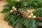 Christmas natural wreath with natural decorations - pinecones, tangerines, dried apples