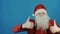 Christmas and New year 2019, man like a Santa Claus shows thumbs up like, on blue background