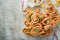Christmas or New Year appetizer. Christmas tree shape puff pastry buns with cheese and ham. Group of Christmas tree shapes on marb