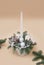 Christmas New Year Arrangement in Decorative Basket with Fir Tree Branches Coniferous and Candles Close up Holiday