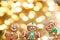 Christmas or New Year background. Ginger snowman and ginger men on a golden background