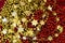 Christmas and New Year background. Red and blue, golden garlands, balls. Golden beads Gold Jewelry. Golden beads. Christmas