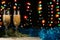 Christmas and New Year background. Romantic dinner of a couple in love with two glasses of champagne. Blue tinsel and spruce branc