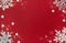 Christmas and New Year background with snowflakes decorations. Trendy Christmas greeting card whith copy space on red background.