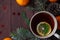 Christmas new year background with tangerines, tea with lemon. winter still. selective focus