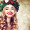 Christmas or New Year Beauty. Smiling Model Woman