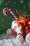 Christmas or New year bright decoration in glass vase with candy canes