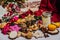 Christmas and new year celebration table decoration background with garland, toys, cookies, cinnamon, pine cones, wallnuts and