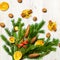 Christmas and New Year composition. Pine branches, cinnamon sticks, dried slices of orange and walnuts. Christmas and