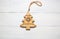 Christmas and New Year composition wooden Christmas tree toys on a white wooden background