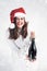 Christmas New Year concept. Model XXL in santa hat with champagne. Fat woman happy. Happy plus size girl hold glass. Big Female i