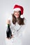 Christmas New Year concept. Model XXL in santa hat with champagne. Fat woman happy. Happy plus size girl hold glass. Big Female i