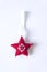 Christmas or New year decor. Red soft star toy