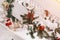 Christmas and New Year decorations on the street. On wooden handrails. Christmas tree and balls, toys, bows and small gifts. In