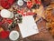 Christmas and New Year decorative composition. Top view, background with copy space for your text. Star, cones, notebook, candle,