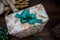 Christmas and New Year details in a photo studio. Present with green ribbon.