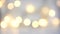 Christmas New Year footage background. Beautiful flickering golden garland bokeh lights on white