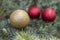 Christmas / New Year Gold and Red Decorative Balls on The Pine Tree