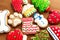 Christmas New Year holiday background, colorfull gingerbread cookies and cones on wooden table. Copy space. holiday concept