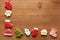 Christmas New Year holiday background, colorfull gingerbread cookies and cones on wooden table. Copy space. holiday concept
