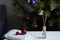 Christmas or New Year home fragrance with air freshener sticks in front of festive tree. Winter holiday aromatherapy
