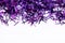 Christmas New Year Purple Confetti Glitter background. Holiday abstract texture