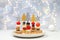 Christmas and New Year\\\'s dishes, a set of snacks for the festive table. Canapes of tomatoes, pate, mozzarella cheese,