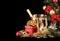 Christmas or New Year\'s Eve. Champagne and Presents over Black