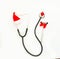Christmas, New Year`s medical flatlay. Stethoscope, gift, Christmas decorations on a white background. Copy space.