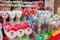 Christmas and New year`s street fair sweet food. Santa shaped candies, lollypops and candy canes sold in outdoor shop