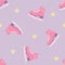 Christmas and New Year seamless pattern. Lavender background with pink skates in vector.