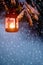 Christmas night. Christmas lantern in winter woods. The snow and