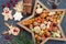 Christmas nuts and dried fruit mix in star-shaped bowl assortment of delicacies and cookies