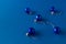 Christmas ornament balls on blue background. Blue aesthetic. Minimal holiday idea. Copy space