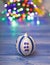 Christmas ornaments concept. Ball ornament on blue wooden surface. Pick colorful decor for christmas tree. Christmas