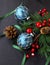 Christmas ornaments with festive balls and pine branches with be