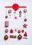 Christmas ornaments flat lay frame composition on white background, top view. Red Christmas decoration and gift wrapping