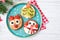 Christmas pancakes in a shapes of deer, tree and snowman made of fresh fruits and berries. Healthy food for kids ideas, top view