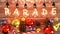 Christmas Parade - cozy wooden table with xmas ornaments with cones, candy cane, shiny balls and warm incandescent bulb lights