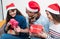 Christmas party with friends, asia people exchange gift and giving present with smiling face,Holiday xmas celebration concept