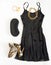 Christmas party outfit. Cocktail dress outfit, night out look on white background. Little black dress, black clutch, leopard shoes