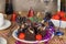 Christmas party table with chocolate cake and strawberrys