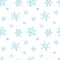 Christmas pattern of light blue falling snowflakes. Winter background. Watercolor Christmas illustration.