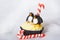 Christmas penguin cupcake with white fondant frosting