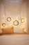 Christmas photo zone, bedroom. Bed with two pillows, home monstera plant. The walls are decorated with New Year\\\'s wreaths of