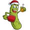 Christmas Pickle cartoon character playing Pickleball in a santa hat